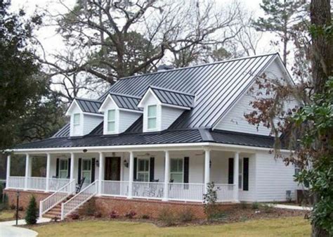 metal roof on off white brick ranch house|brick house metal roof pictures.